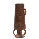 DRC., Kuba-Lele, wooden drumstanding on a stool with four curved legs, the grip in the form of a