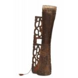 Papau Barat, Asmat, hourglass shaped drum, em,with low relief carvings of bipanew, the open worked