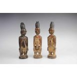 Nigeria, Yoruba, Igbomina, three standing male Ibejirich patina. Provenance H. Heinemans,