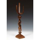 DRC., Luba, bow stand,standing female figure with full keloid scarification's on her belly with