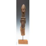 Nigeria, Wurkun, pole shaped anthropomorphic figure,pierced nose, notched eyes and incised