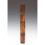 Borneo, Central Kalimantan, bamboo containerwith a graphic pattern on both sides of two spirit