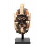 New Ireland, Tabar Islands, mask, ca. 1970,with a central high crest, jutting ears and tong.