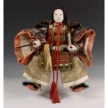 Japan, Samurai pop 'musha ningyo',met gofun hoofd h. ca. 40 cm. [1]