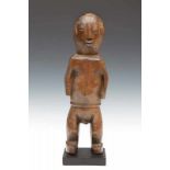 DRC., Ngbaka, standing female figure,with central incised elongated pattern on torso, dressed with