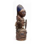 Nigeria, Yoruba, Ekiti, Efon-Alaye, helmet mask, efon;consisting of a standing female figure dressed