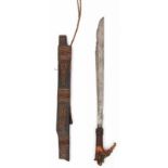 Central Borneo, Kayan Kenyah, sword, mandau,the blade with incised pattern and brass inlay. The dear