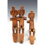 Sumatra, South Nias, three ancestor figures, 19th century.for an altar, daro-daro, with flexed legs,