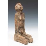 Ghana, terracotta seated female figure;bought from Henk Kouw, 1970's. (one leg broken) h. 42 cm. [1]