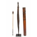 PNG, Sepik, wooden implementwith braided rattan, Celebes, bambo container and an Moluccas arrow. [3]