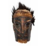 Sumatra, Batak, Simalungun, funeral mask,pierced mouth and eyes, traces of red and white pigments,