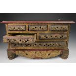 Sumatra, small wooden jewerly chest, ca. 1900.with six drawers with carved flower patterns in high