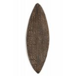 PNG, Sentani, oval wooden dishdecorated with curve linear carving L. 68 cm. [1]