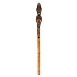 PNG, Sepik, bamboo flutewith ancestor figure as stopper. h. 103 cm. [1]