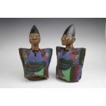 Nigeria, Yoruba, pair of female twin figuresdressed in beaded mantel with crocodile design. h. 30