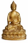 Sitzender Buddha, Tibet wohl Anf. 20. Jh. Bronze, vergoldet. Auf Lotosthron sitzender Buddha, eine