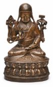Buddha mit Mönchshaube, Südtibet wohl 16. Jh. Bronze, braun patiniert u. partiell rot bemalt. In