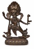 Figur Zwei Götter, wohl Tibet 19. Jh. Bronze, dunkel patiniert. 2 Standfiguren, d. größere davon