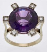 Amethyst-Ring Art-Deco um 1930hohe 18 kt WG-Fassung mit einem runden Amethyst im Treppenschliff,