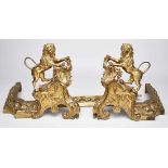 3-tlg. Kaminbockgarnitur, Louis-XV-Stil, Frankreich Ende 19. Jh.Bronze vergoldet. Durchbrochener