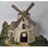 Mechanische Schießhallenfigur "Windmühle", um 1900 Eisenblech, bemalt. Ein Treffer versetzt die