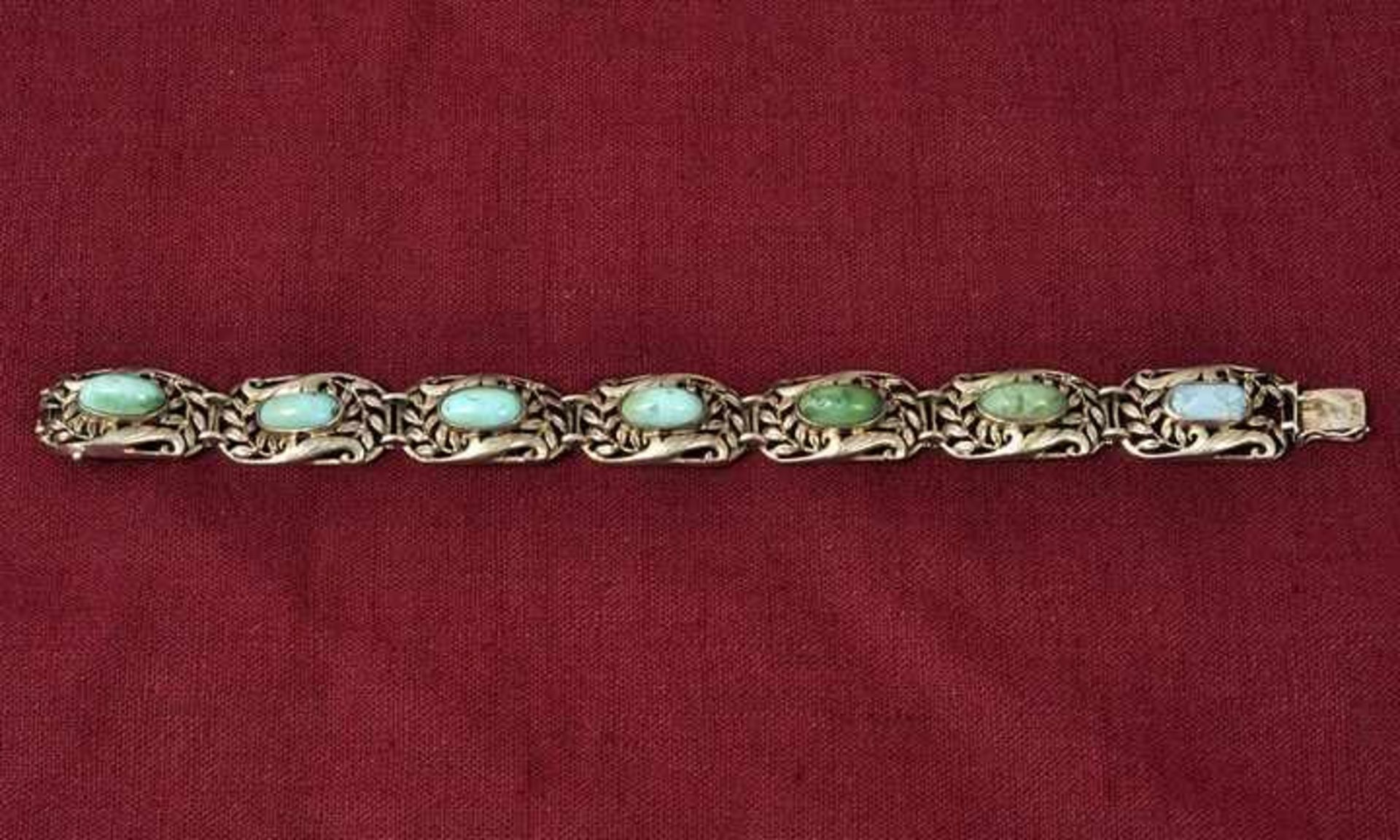 Gliederarmband, Anf. 20. Jh.Silber 835, 7 oktogonale Glieder, in Ranken durchbrochen, jeweils