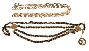 Chanel, a gilt metal and black leather handbag chain, stamped marks, logos and copyright 1984, 88cm