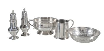 Five items of silver, comprising: a circular bonbon dish by Saunders and Shepherd, Birmingham 1919,
