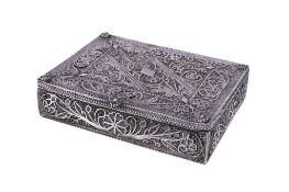 An Indian silver filigree rectangular table box, unmarked, circa 1900, with flowers and scroll