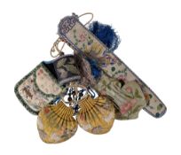 A collection of Chinese silk purses, late 19th and early 20th century, including: a pair in yellow