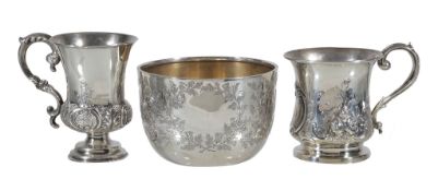 Two Victorian silver christening mugs, the waisted example by Robert Harper , London 1859, embossed