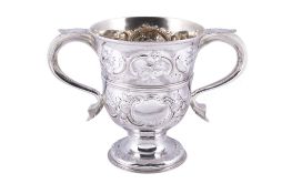 An early George III silver twin handled cup, mark of Thomas Wallis I over-striking that of another,