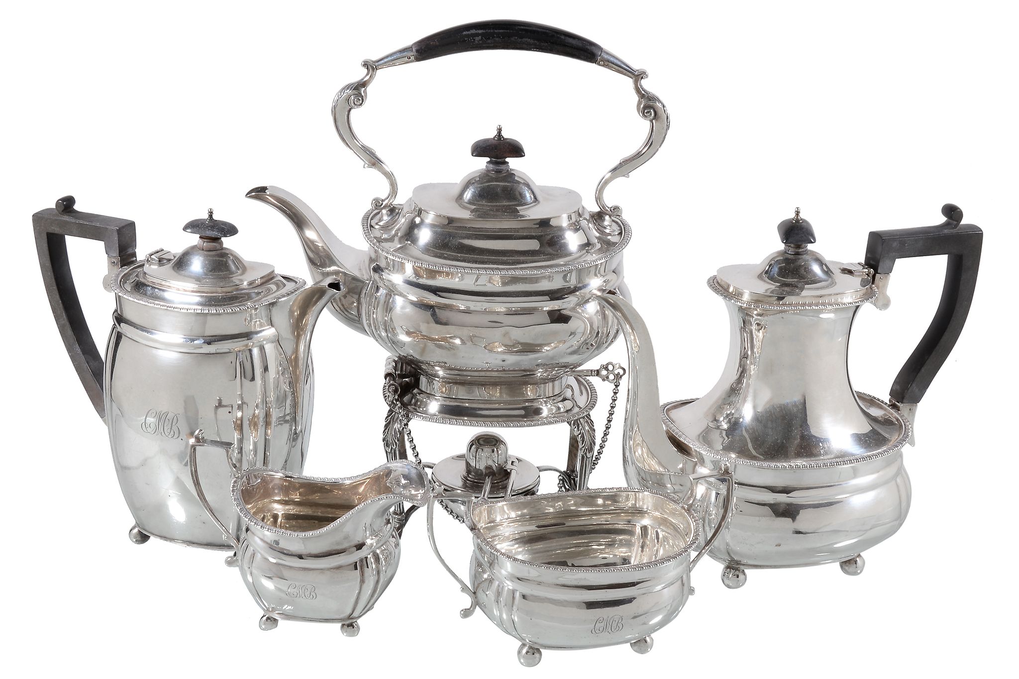 An Edwardian silver oblong baluster tea and coffee service by Heming & Co. Ltd, London 1917-1922,