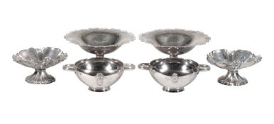 A pair of silver shaped circular pedestal dishes by William Neale & Son Ltd., Birmingham 1922, with