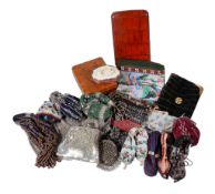 Ω A collection of purses, 19th and 20th century, including beaded, woven and embroidered