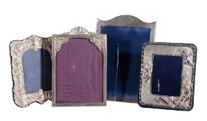 Four silver mounted photograph frames, to include: a shaped rectangular frame, maker's mark RBB,