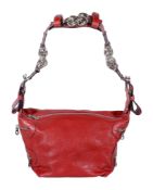 Chloe, a red leather shoulder bag, with a red leather and chain link shoulder strap, four external