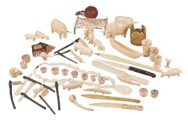 Ω A collection of Indian carved ivory items, late 19th or early 20th century, some with painted