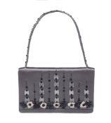 Prada, a grey fabric and applique clutch bag, single loop handle, press button fastener opening to