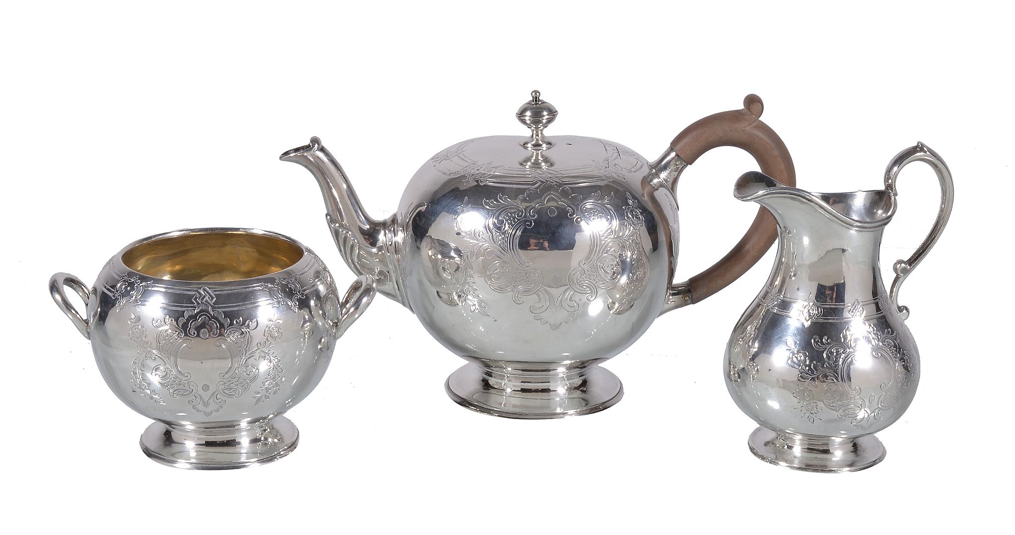 A matched Victorian silver bachelor's tea service by Robert Harper, London 1865, the tea pot 1876,