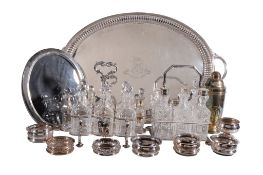 A Victorian electro-plated cruet stand and bottles , in the Warwick style; another rectangular; an