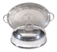 An electro-plated oval domed meat cover, early 20th century, engraved with a demi lion crest,