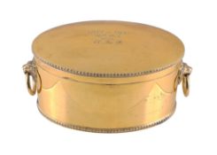 A silver gilt oval biscuit box by Atkin Brothers, Sheffield 1928, the hinged cover engraved 1881