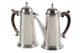 A pair of cylindrical tapering cafe au lait pots by Richard Burbidge of Harrods Ltd., London 1921,