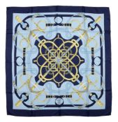 Hermes, Eperon d'Or, a blue and yellow silk scarf, designed by Henri d'Origny, with spurs and