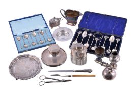 A collection of small silver, including: a set of six Victorian tea spoons, a caddy spoon and tongs