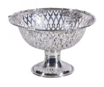 An Edwardian silver pedestal dessert basket by William Disney Barlow, Birmingham 1905, the pierced