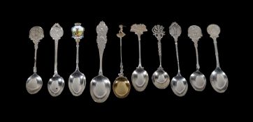 [Golf] Ten tea spoons, 20th century makers and dates, one with a shield shaped terminal enamelled