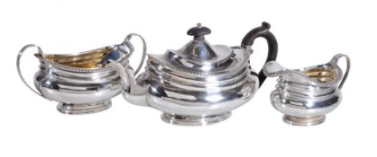 A George IV silver three piece oblong baluster tea service by Michael Starkey, London 1828 and