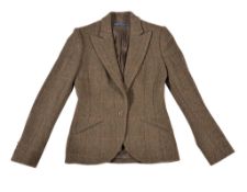 Ralph Lauren, a lady's tweed jacket, with full length sleeves and two outer pockets, size 8